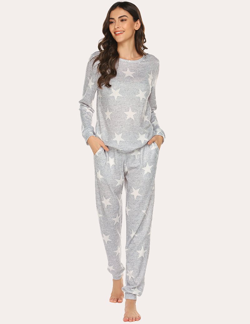 Gray pajama set with white star print, long-sleeve top and matching jogger pants