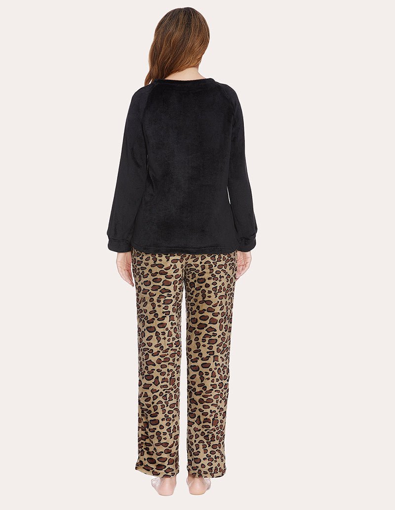 Black fleece pajama set, back view: long-sleeve top with leopard pants