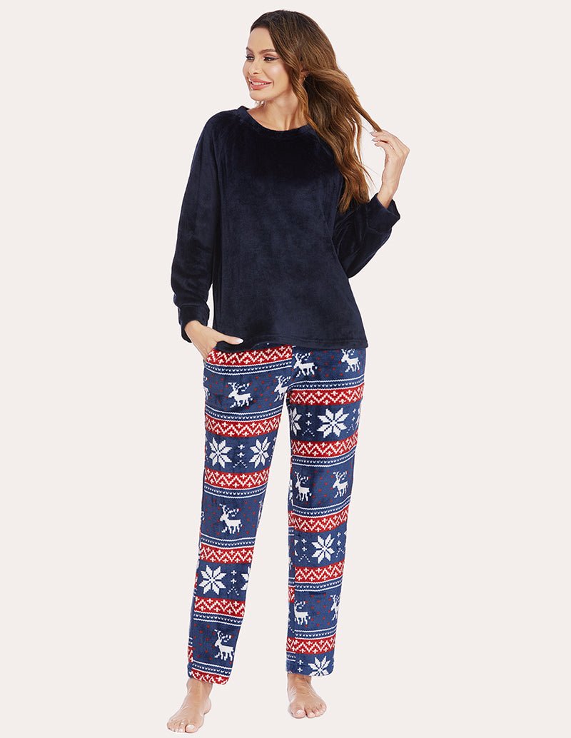 Women's fleece pajama set, navy top with blue reindeer and fair isle pants