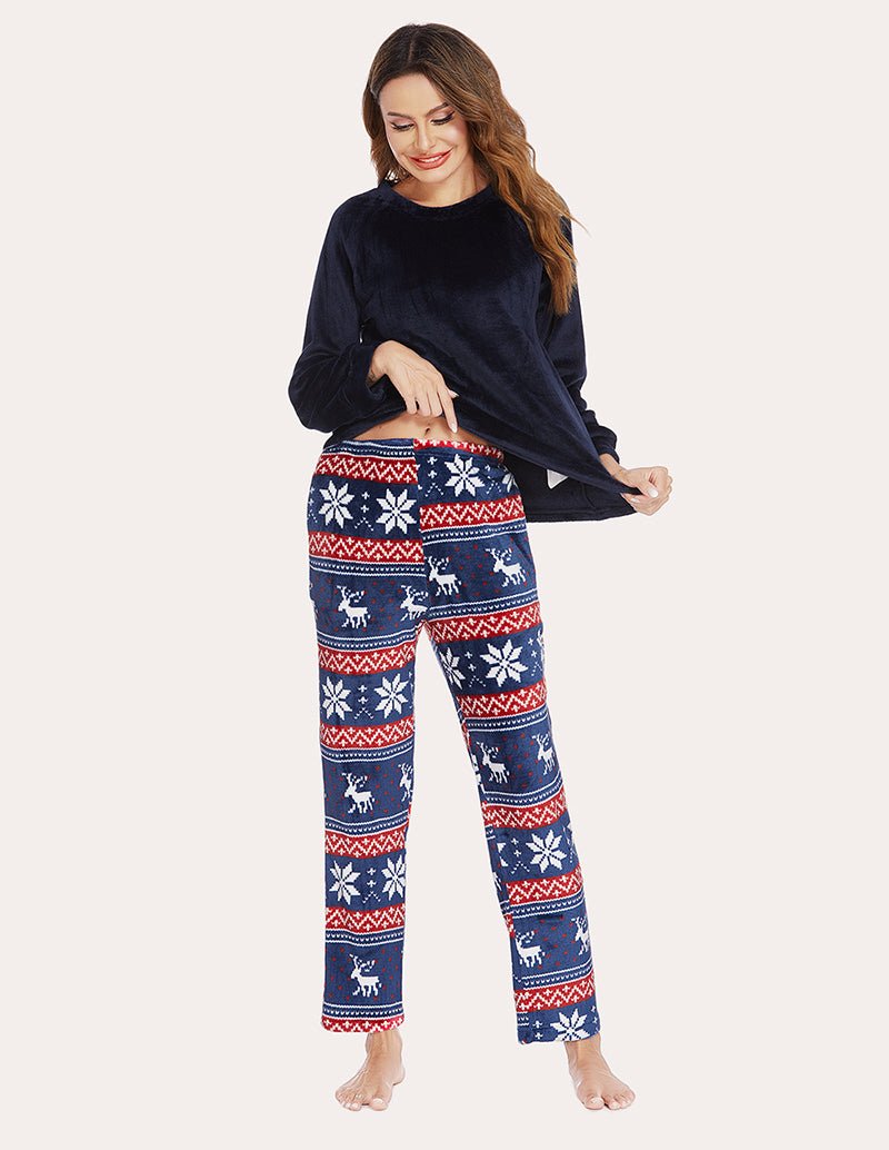 Women's fleece pajama set, navy long-sleeve top with patterned reindeer lounge pants