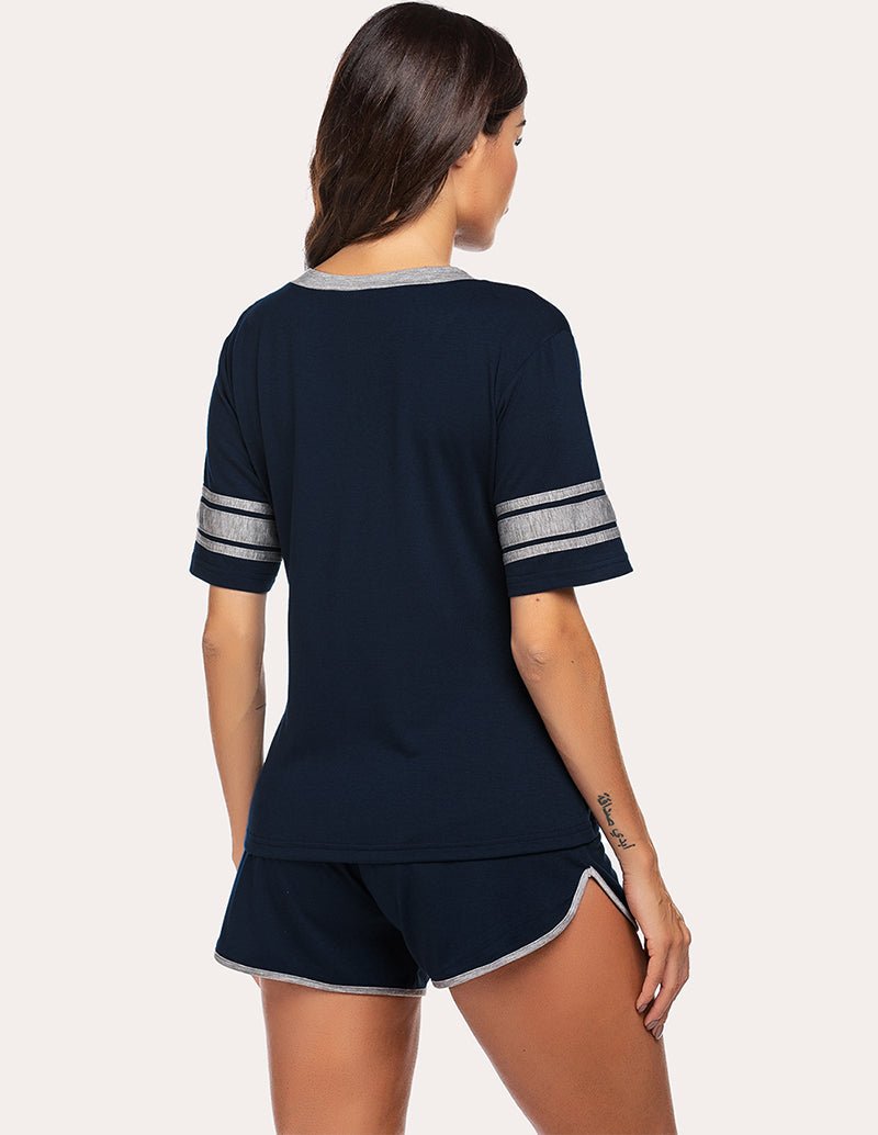 Dark navy sweet pajama set with V-neck back and striped sleeve cuffs, matching shorts