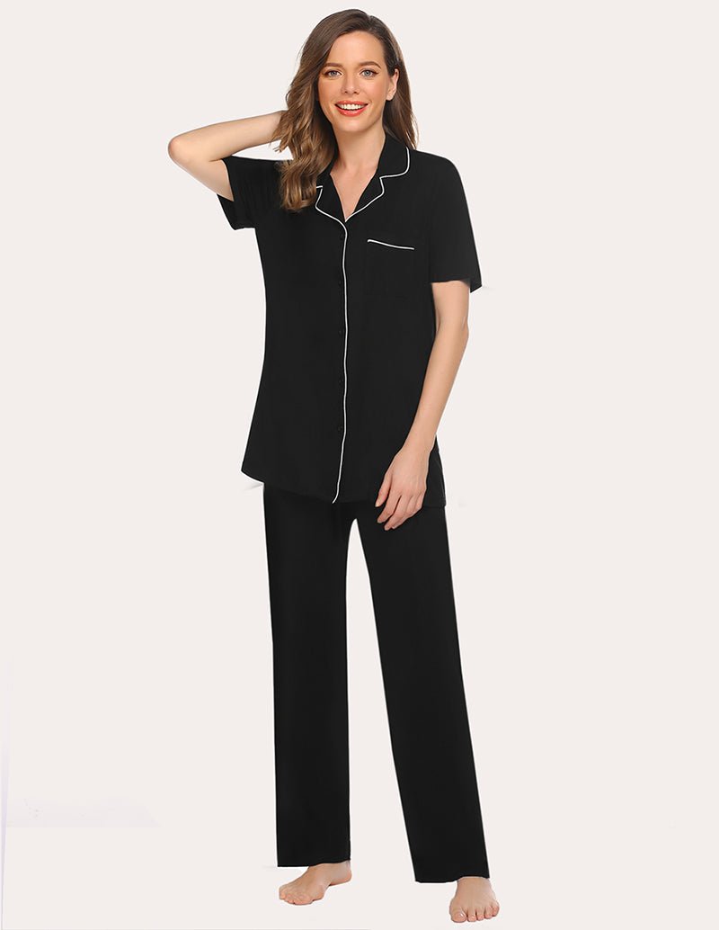 Black short-sleeve pajama shirt and long pants with white contrast piping