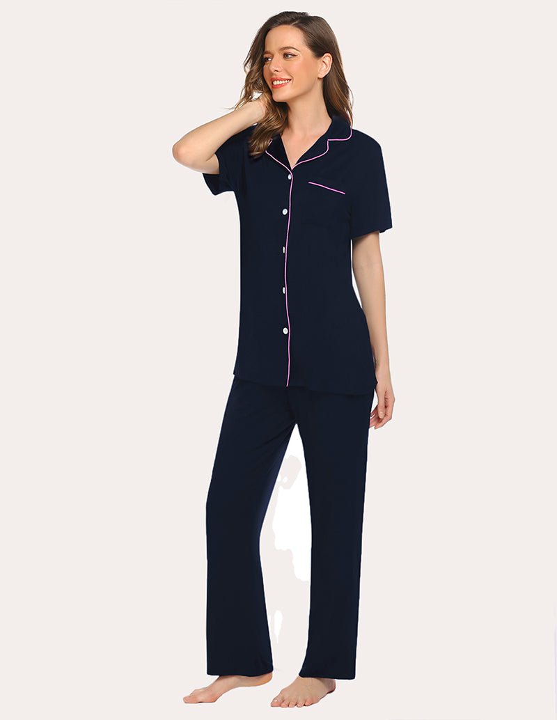 Navy short-sleeve pajama shirt and long pants with pink contrast piping