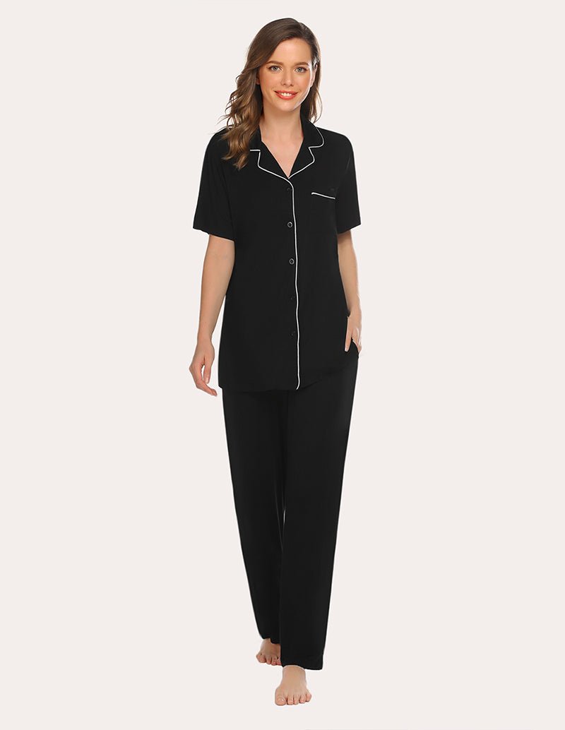 Black short-sleeve pajama shirt and long pants with white contrast piping