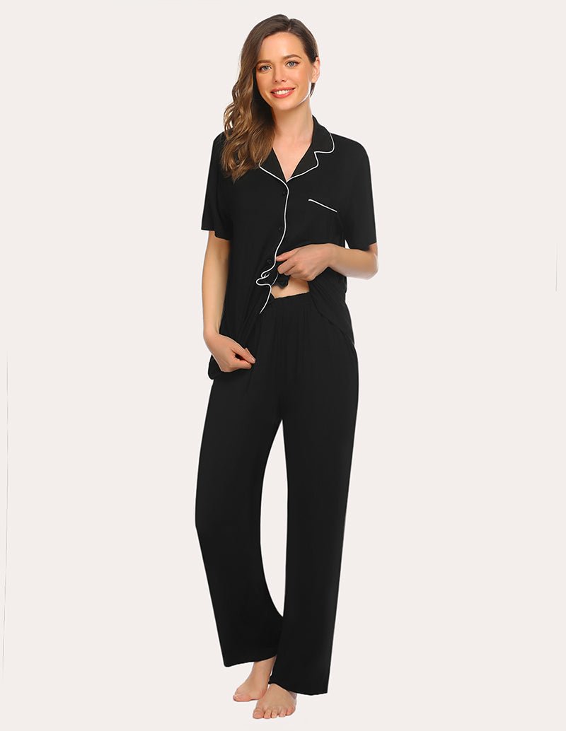Black pajama set with short sleeves and button placket; straight-leg trousers