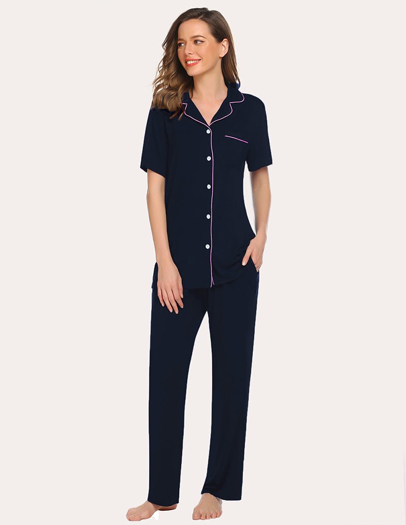 Navy pajama set with button closure and chest pocket; contrast pink trim