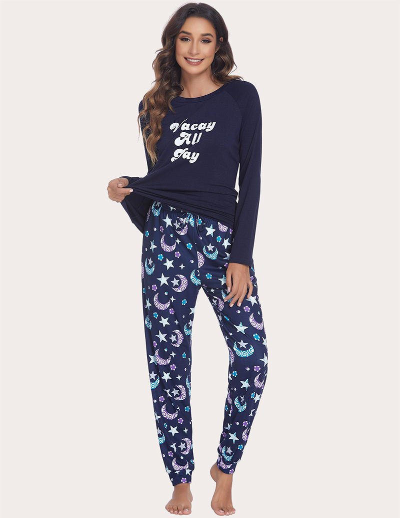 Navy lounge top with “Vacay All Day” graphic and blue starry pajama pants set