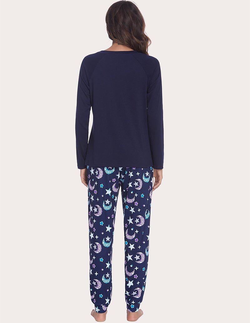 Navy long-sleeve lounge top with galaxy print long pants set, back view
