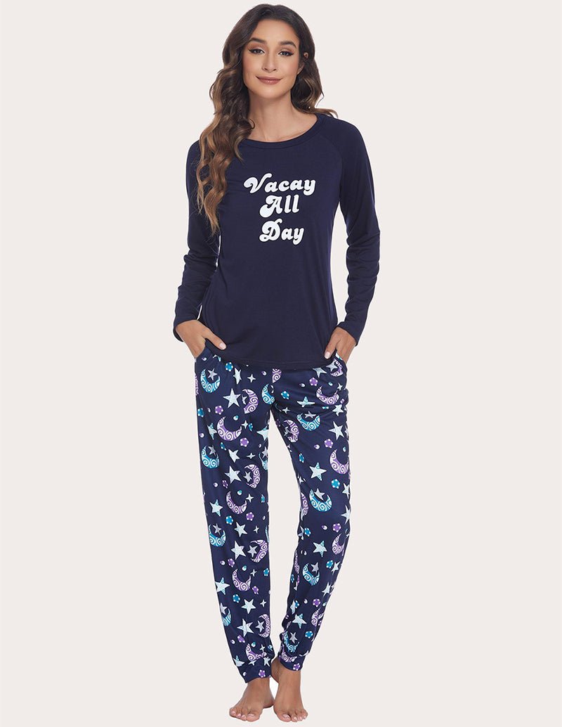 Navy long-sleeve lounge top with “Vacay All Day” print and starry pajama pants set