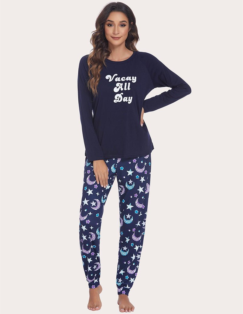 Navy long-sleeve lounge top with “Vacay All Day” print and galaxy pajama pants set