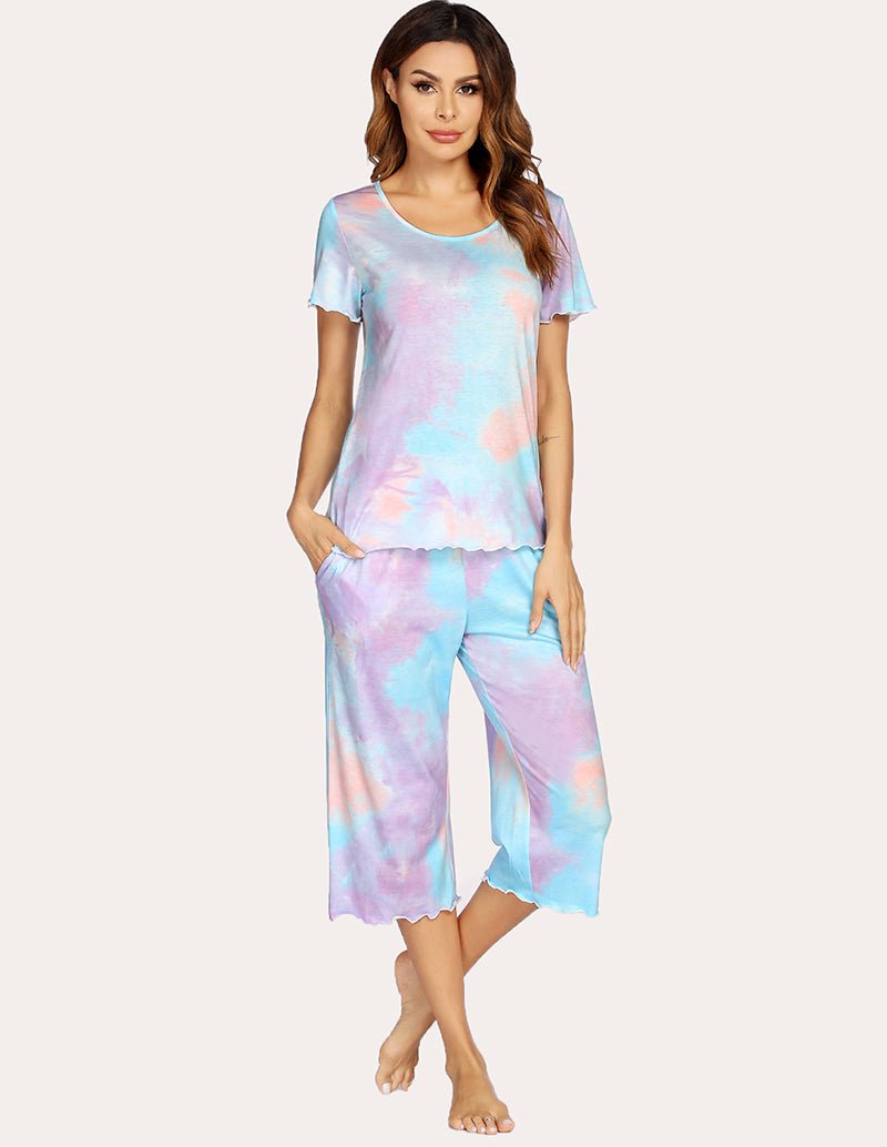 Tie-dye pajama set with short-sleeve top and cropped wide-leg pants, front view.