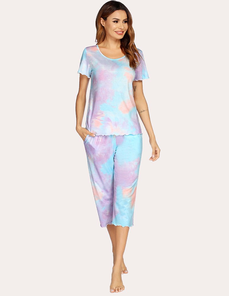 Tie-dye pajama set with short-sleeve top and cropped wide-leg pants, full front.