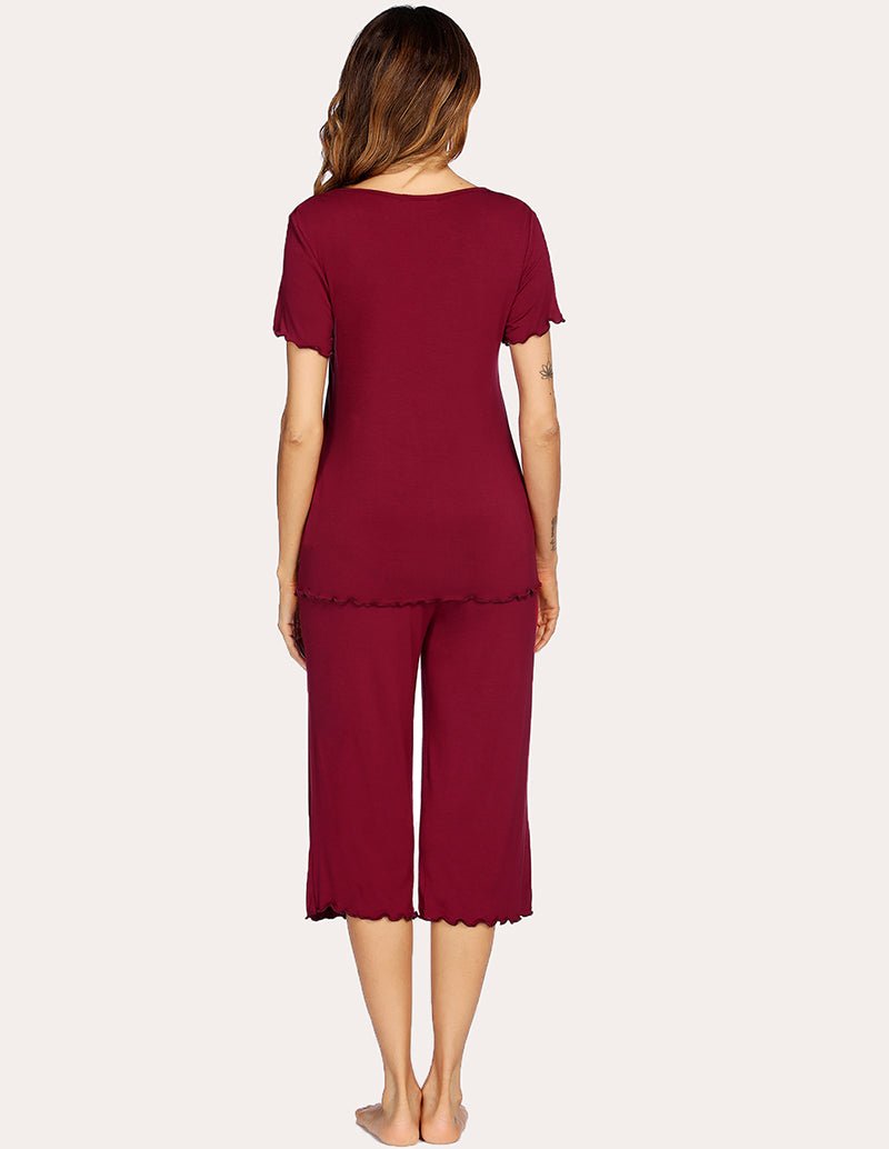 Wine red pajama set showing back view: short-sleeve top and cropped wide-leg pants.