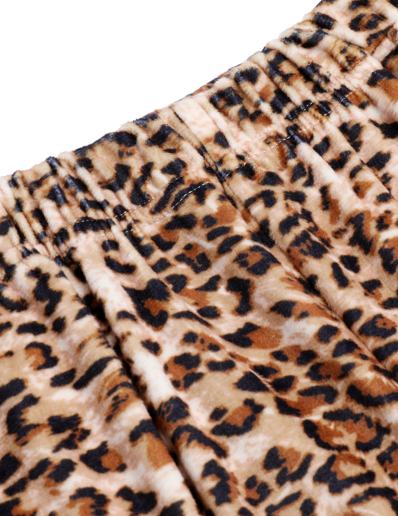 Leopard-print velour pajama fabric with brown-and-black spots