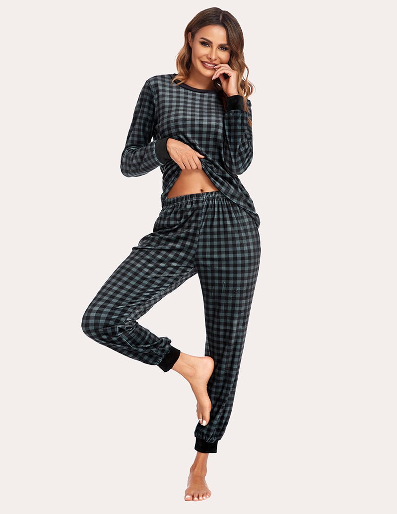 Velvet plaid pajama set in dark plaid; long-sleeve top and cuffed jogger pants