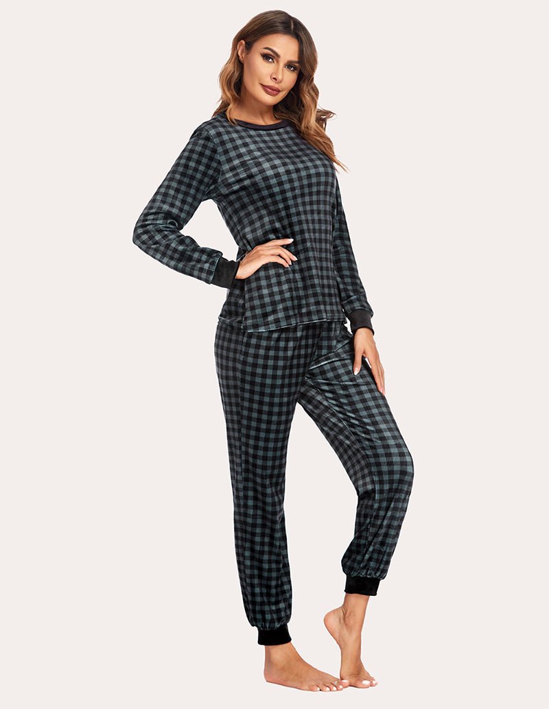 Velvet plaid pajama set in dark green and black plaid; long sleeves and ankle jogger legs