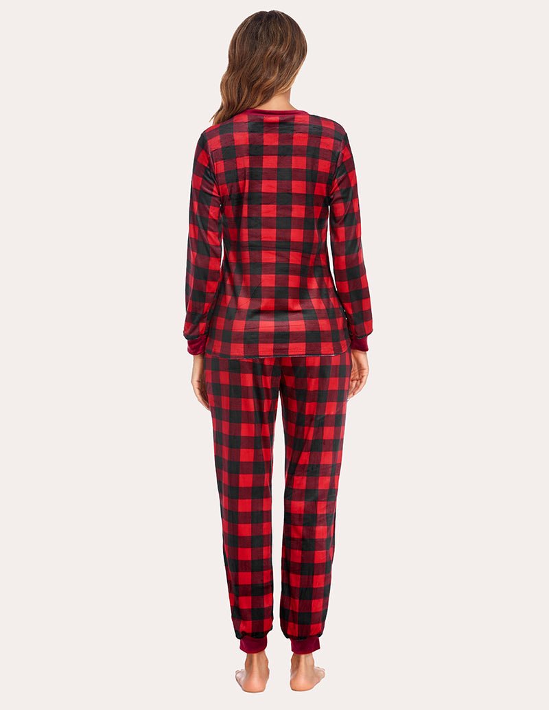 Velvet plaid pajama set back view in red and black; long sleeves and tapered jogger pants