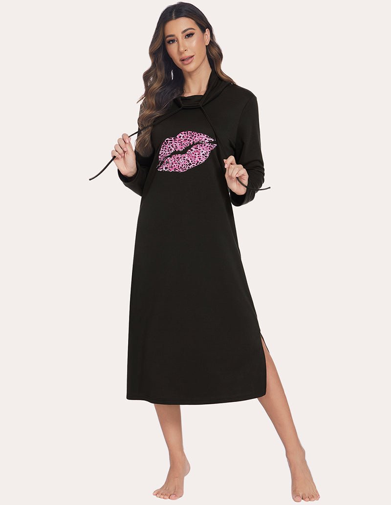 Warm high-neck sleep dress in black, front view, hood with drawstring, pink chest graphic