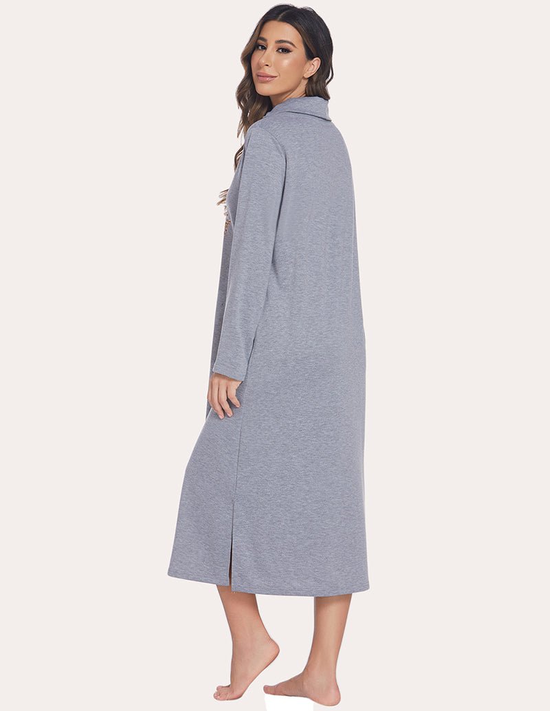 Warm sleep dress in light grey with high neck hood and long sleeves, side slit at hem.