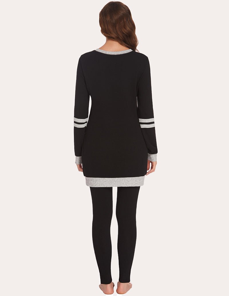 Black long-sleeve pajama tunic top with striped cuffs from back and matching leggings