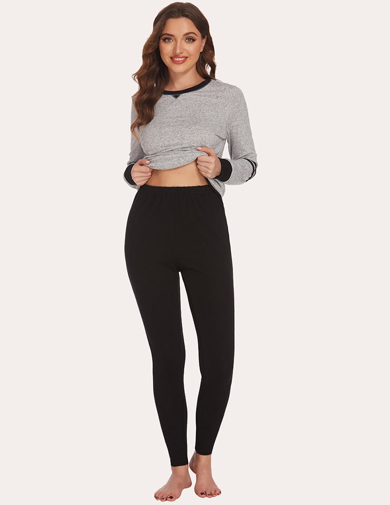 Heather gray long-sleeve pajama tunic top with striped cuffs and black leggings, front view