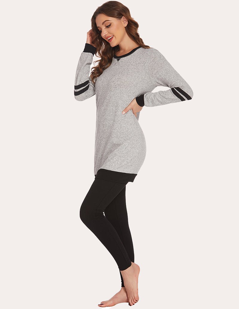 Heather gray long-sleeve pajama tunic top with striped cuffs and black leggings, side view