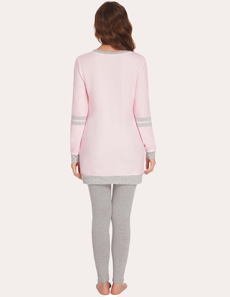 Light pink long-sleeve pajama tunic top with striped cuffs from back and gray leggings