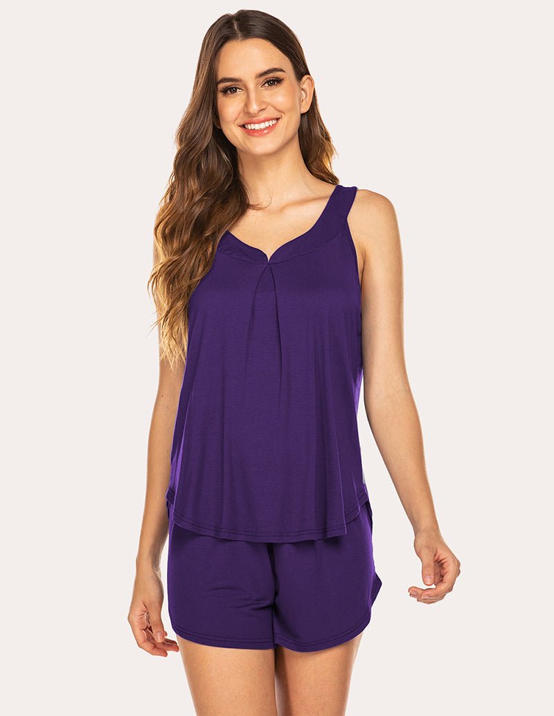 Purple wide-strap pajama tank and matching sleep shorts set on model, front view