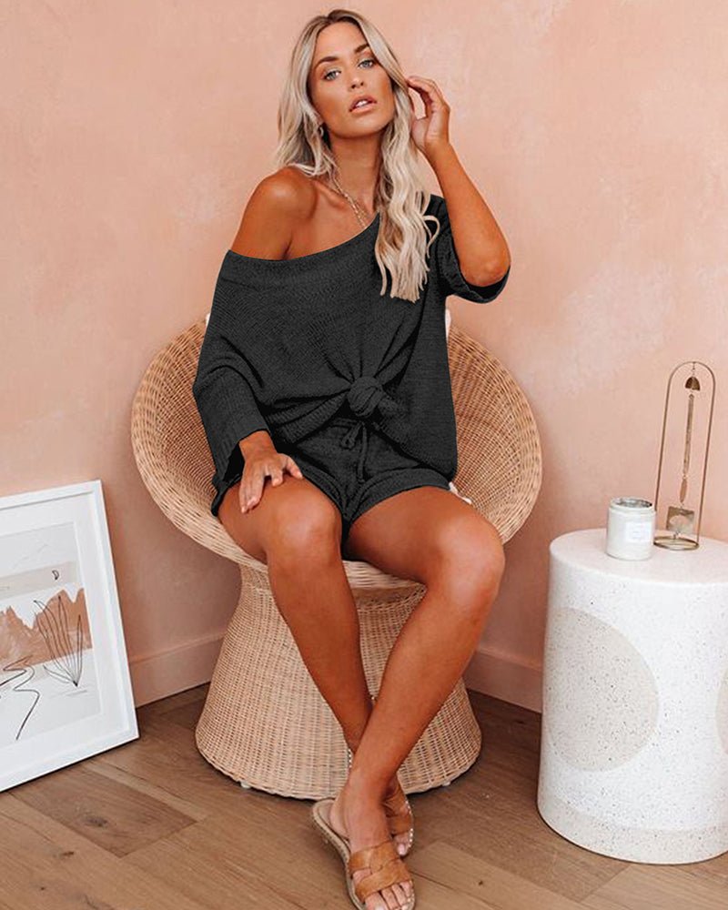 Black off-shoulder sweater and drawstring shorts set with tied waist