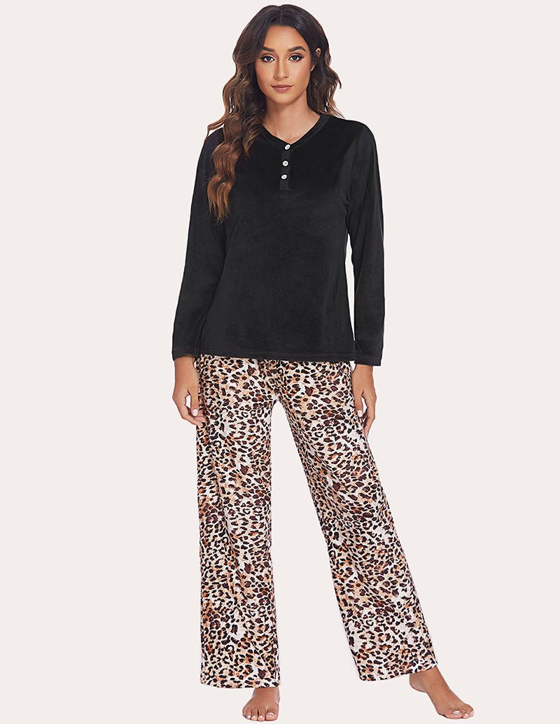 Women's pajama set with solid black Henley shirt and leopard-print lounge pants