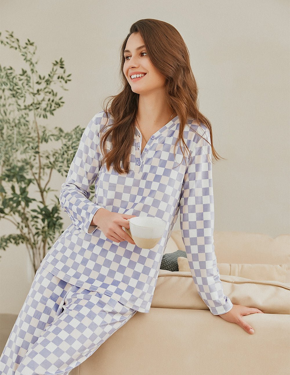 Women's pajama set with light blue check print, button-front long-sleeve shirt and pants