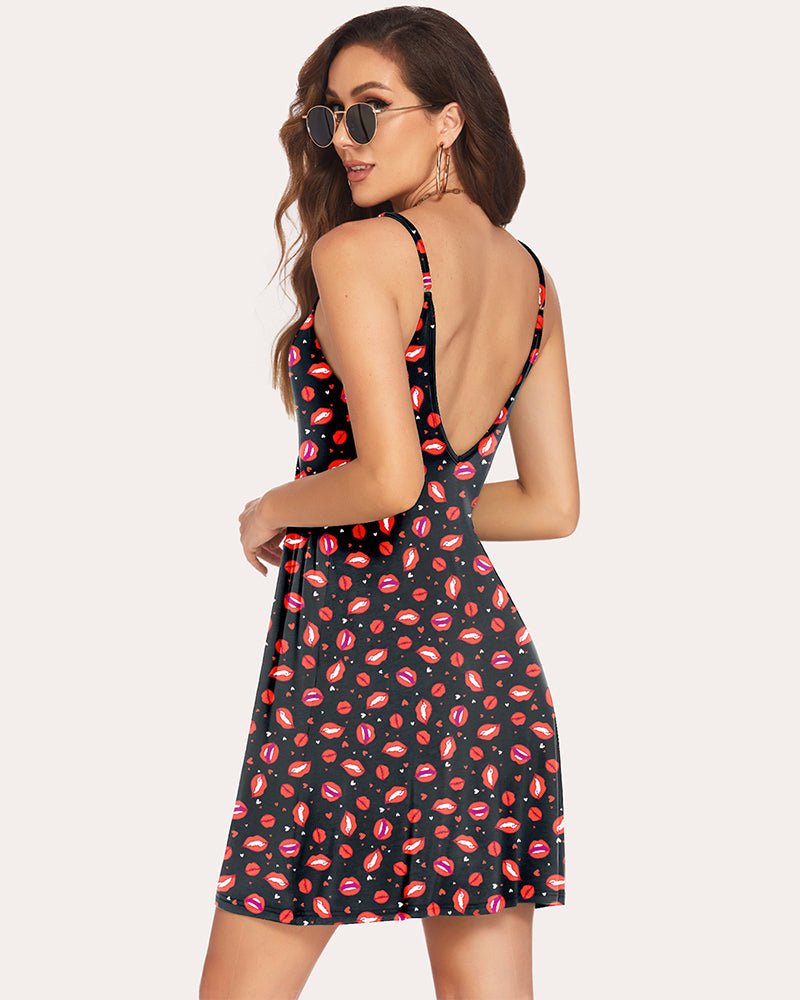 Women’s sleep slip nightgown, V-neck with spaghetti straps, rose floral print, back view.