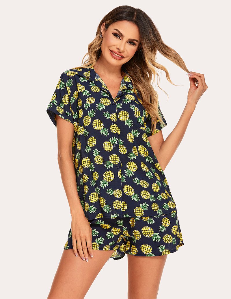 Woven short-sleeve pajama set in navy with lemon print, front view with button-front top