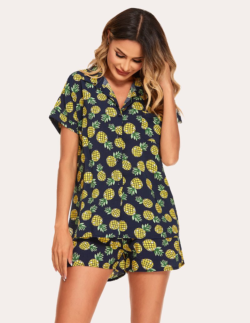 Woven short-sleeve pajama set in navy with lemon print, front view with matching elastic-waist shorts