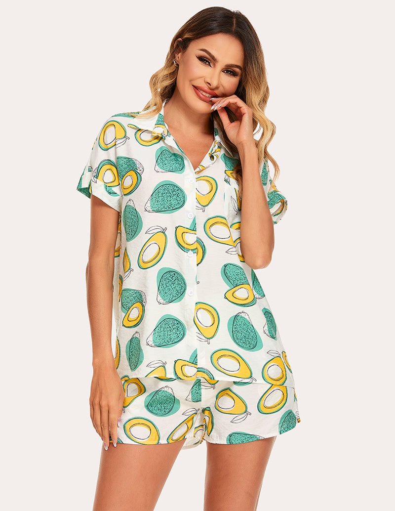 Woven short-sleeve pajama set with light background and avocado print, button-front top and shorts