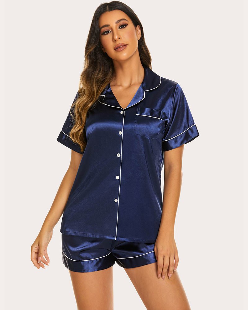 Navy silk short-sleeve pajama set with pocket, button front, and contrast trim shorts
