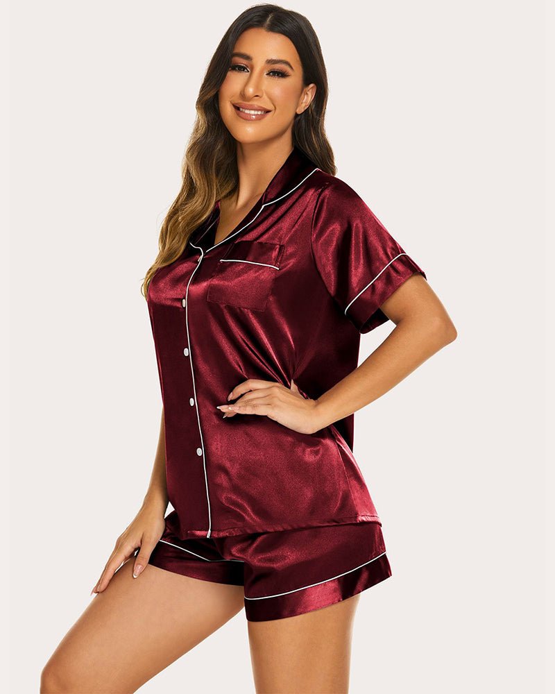 Burgundy satin short-sleeve pajama set with contrast piping, pocket, and matching shorts