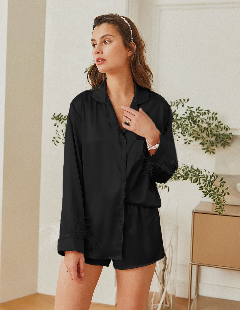 Feather-trim satin pajama set in black, button-up shirt with feather cuffs and shorts
