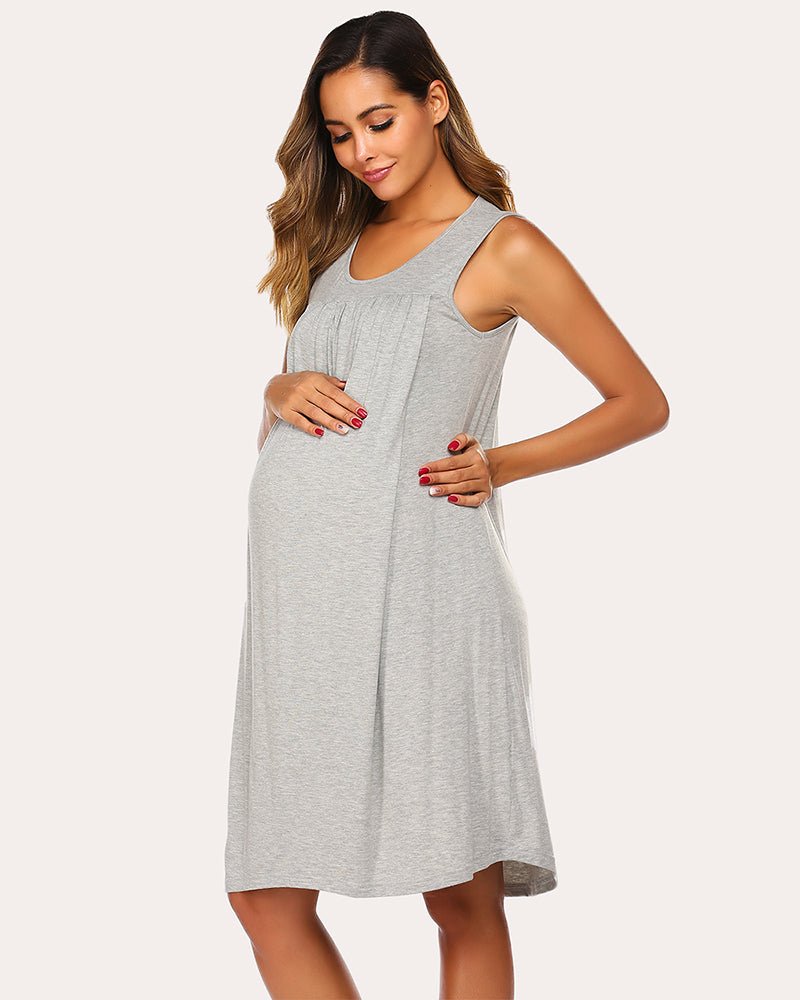 Light grey sleeveless round-neck maternity nursing dress with side pleats